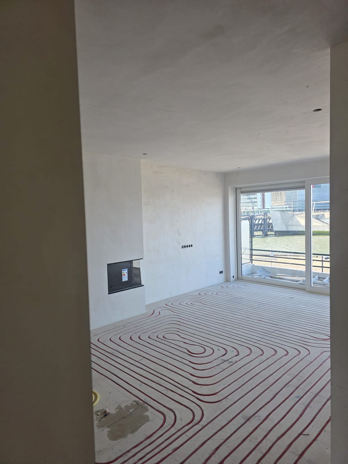 Vloerverwarming — woonkamer — Rawza Installatiebedrijf